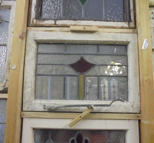 Stained glass window with latch
