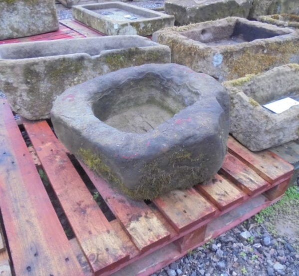 rounded stone trough