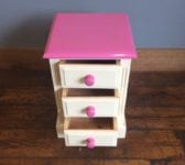 Pink Three Drawer Bedside Table