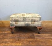 Upholstered Foot Stool On Castors
