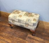 Upholstered Foot Stool On Wheels