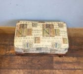 Upholstered Foot Stool On Wheels