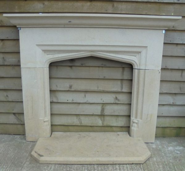 Carved stone fire surround