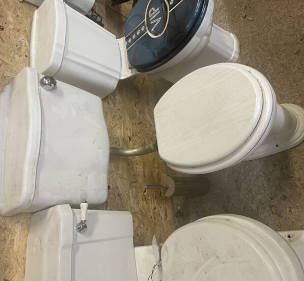 Toilet with Silver Piped Cistern