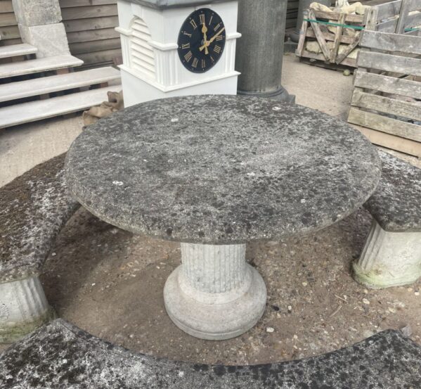 Weathered Stone Table With Benches