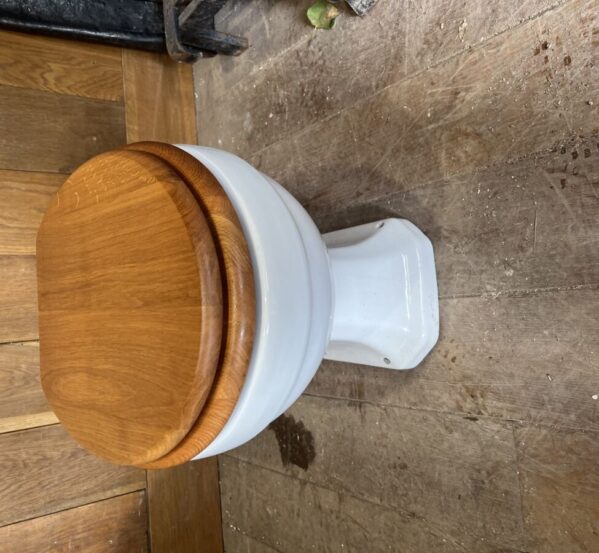 Lovely Toilet with Wooden Lid