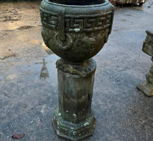 Stone Urn with Damaged Base on Stand
