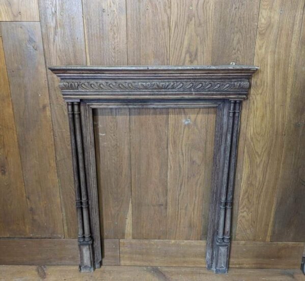 Small Wooden Surround with Decorative Pillars