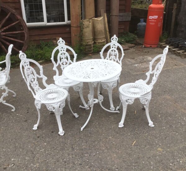 White Aluminum Table And 4 Matching Chairs
