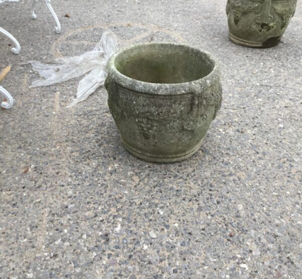 Two Weathered Stone Pots, Grape Motive