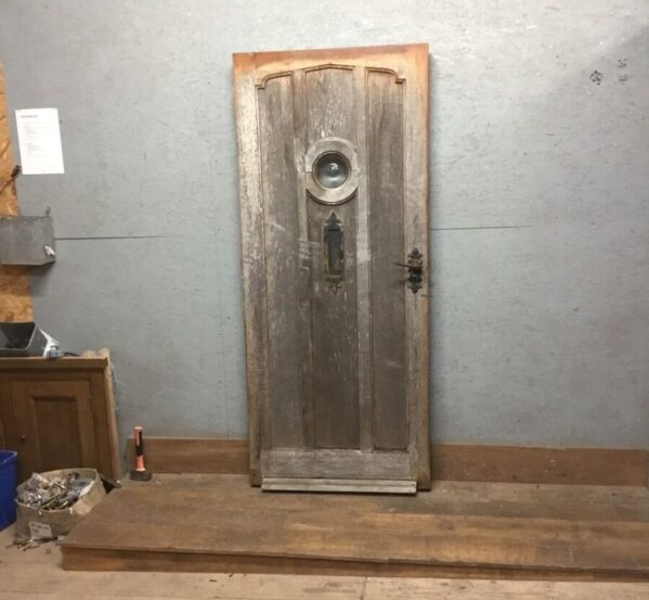 Bowed Oak Door With Water Damage