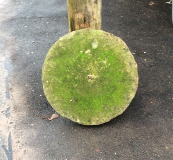 Well Weathered Mossy Grindstone