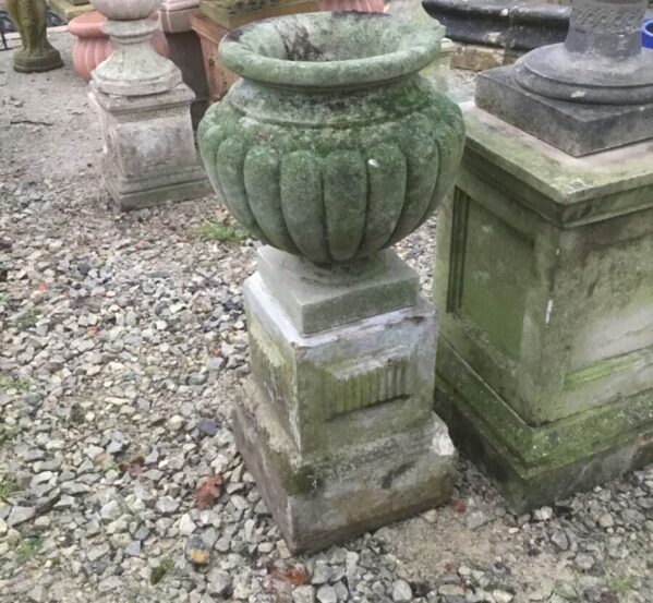 Weathered Bulbous Urn On Stand