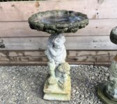 Boys Holding Bird Bath
