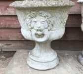 Weathered Stone Lion Head Urn