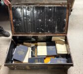 Weathered Chest with Books