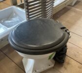 Toilet with Black Seat